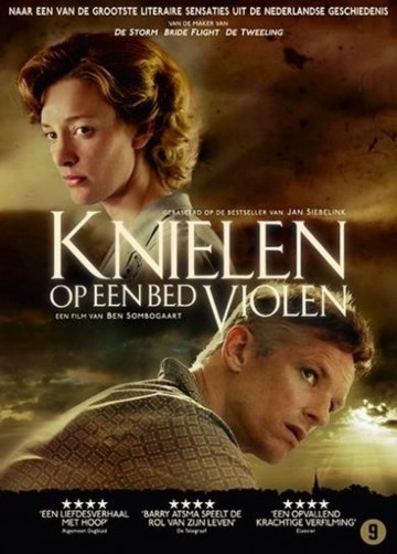 Knielen Op Een Bed Violen